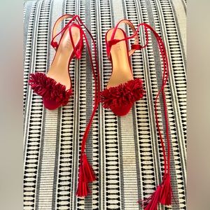 Red Fringe low block heel. Size 7 but fits more like 7.5. Only wore once.
